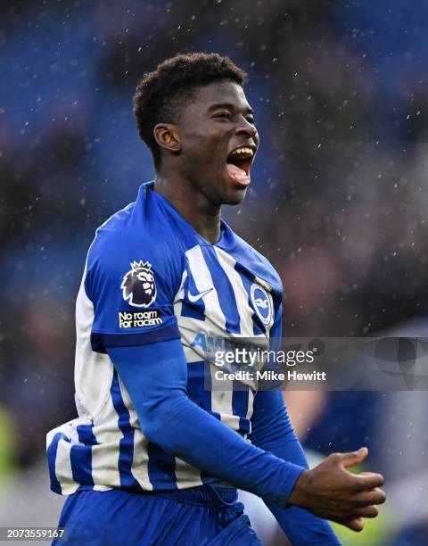 brighton-england-carlos-baleba-of-brighton-hove-albion-celebrates-at-full-time-following-the.jpg