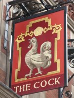 Sign_for_The_Cock,_Great_Portland_Street_-_Margaret_Street,_W1_-_geograph.org.uk_-_1528682.jpg