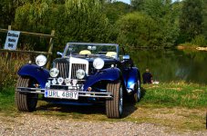 car beside lake.jpg