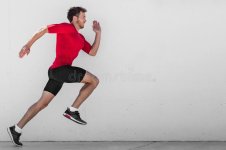 running-man-runner-training-doing-outdoor-city-run-sprinting-along-wall-background-urban-healthy.jpg