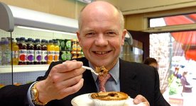 william-hague-samples-one-of-rathbones-steak-pies-during-his-visit-to-up-holland-_460-516021213.jpg